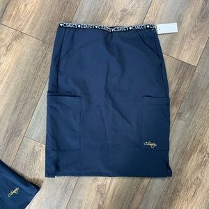 Scrub skirt and shirt! 😍 C. Saucy scrub shirt and skirt set. Navy blue. New!
